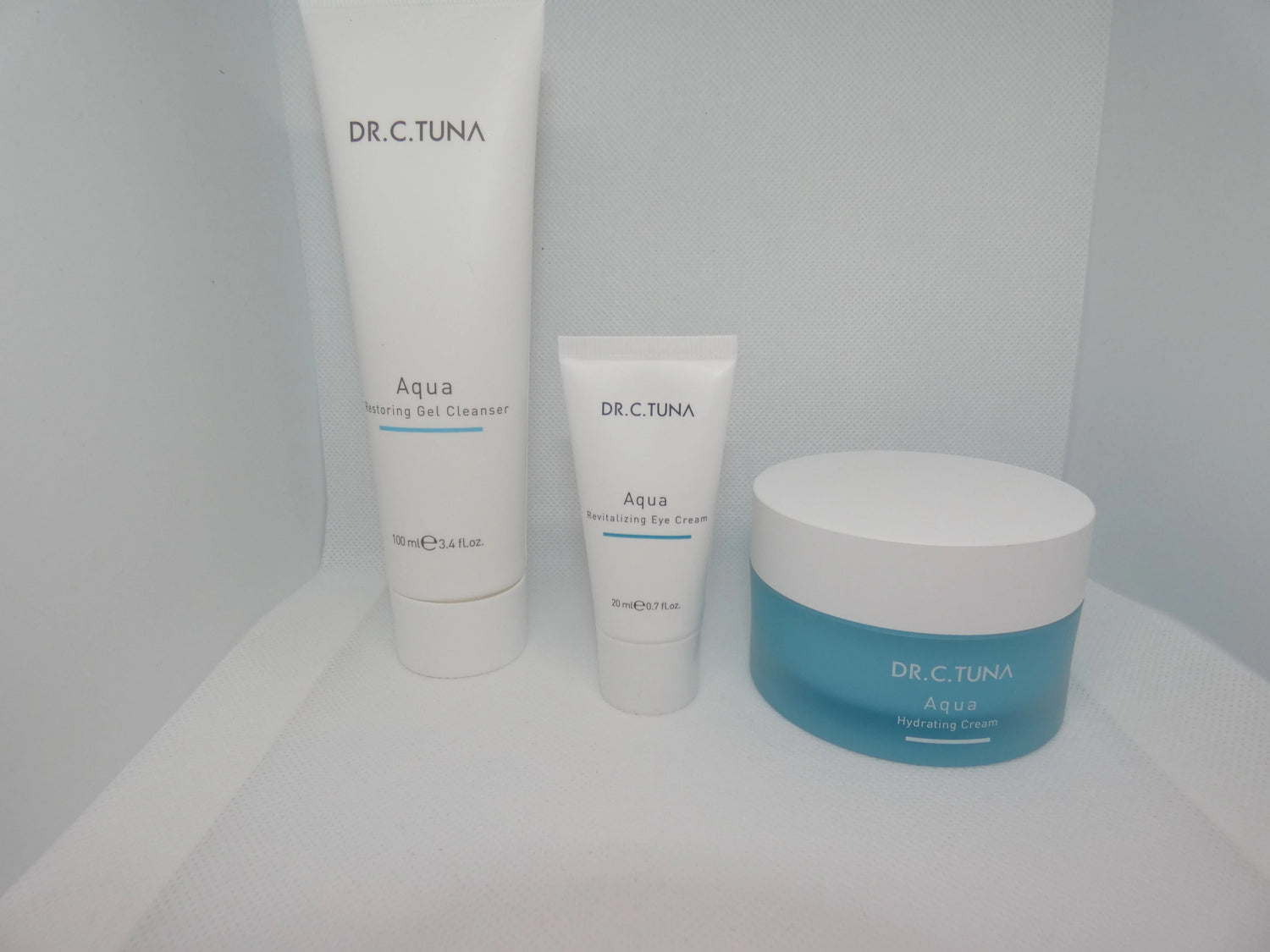 Productos DR.C.TUNA Aqua: limpiador gel, crema revitalizante de ojos y crema hidratante
